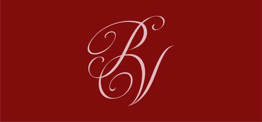 "PV" monogram in elegant script on a red background.
