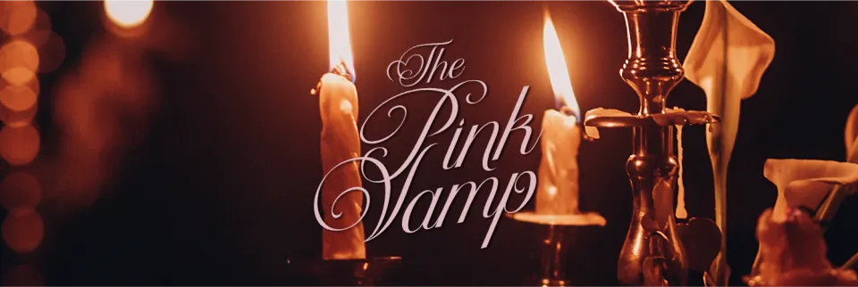 Candles with warm light, orange dominant.